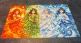Four colorful illustrations of women with different attributes on a playmat