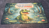 Cartoon alligator and humorous text on a textured surface